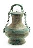 An Archaic Bronze Ritual Wine Vessel, Tilianghu Height 12 1/2 x width 9 1/2 inches.