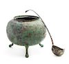 A Large and Rare Bronze Tripod Tureen and Ladle Diameter of tureen 9 inches.