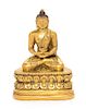 A Small Sino-Tibetan Gilt Bronze Figure of Shakyamuni Buddha Height 3 1/2 inches.