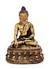 A Sino-Tibetan Gilt Bronze Figure of Shakyamuni Buddha Height 6 inches.