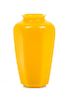 * A Small Yellow Glass Hexagonal Bottle Height 4 inches.