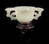 A White Jade Double Handled Cup Length 4 7/8 inches.
