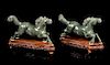 * A Pair of Spinach Jade Figures of Horses Length of each 8 1/4 inches.