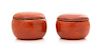 A Pair of Red Lacquered Covered Boxes Diameter of each 4 1/2 inches.