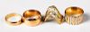 Four 14K yellow gold rings