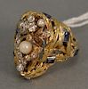 18 karat gold ring set with diamonds, sapphires, and pearl. size 7, 13.7 grams
