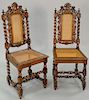 Set of fifteen plus one near matching caned walnut side chairs, each with dual carved lions and twist turned supports and legs (all ...