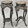 Two Chinese carved stand with inset marble tops. ht. 34 1/2 in. and ht. 37 in. Provenance: From an estate in Lloyd Harbor, Long Isla...