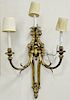 Set of four French style bronze three light sconces. ht. 30 in. Provenance: From an estate in Lloyd Harbor, Long Island, New York