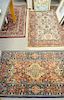 Four Oriental style throw rugs, one is a Karastan. 3'9" x 5', 4' x 6', 2'9" x 5', and 2'6" x 4'