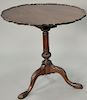 Mahogany piecrust tip table. ht. 29 in., dia. 29 1/2 in.