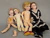 Four bisque head dolls, two with kid bodies and two jointed composition. ht. 13 1/2 in. to 18 in.