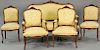 Five piece walnut Louis XV style salon suite with loveseat (lg. 63 in.), two armchairs, and two side chairs, all in floral embroider...