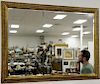 Three piece group to include two large gold framed mirrors (48" x 36" & 58 1/2" x 44") and a large three dimensional plaster plaque ...