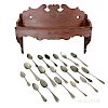 Carved Pine Hanging Spoon Rack and Sixteen Pewter Spoons.  Estimate $200-250
