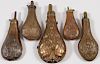 A GOOD GROUP OF FIVE POWDER FLASKS, 19TH C