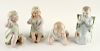 4 CONTINENTAL PORCELAIN PIANO BABY FIGURES