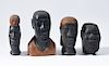 Grouping of four Haitian male portrait/bust wood carvings