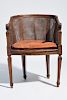French Louis XVI walnut cane seat and back arm chair, 19th C.
