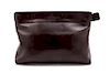 * A Chanel Brown Leather Large Clutch, 12 x 8 x 3 inches.