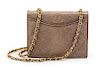* A Chanel Taupe Quilted Lizardskin Flap Bag, 7 1/2 x 6 x 3 inches.