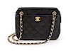 A Chanel Black Quilted Caviar Leather Bag, 10 x 7 x 3 inches.
