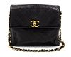 * A Chanel Black Quilted Leather Flap Bag, 10 1/2 x 8 1/2 x 2 inches.