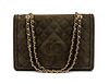 * A Chanel Green Quilted Suede Flap Bag, 11 x 7 1/2 x 3 inches.
