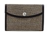 * An Hermes Black and Ivory Woven Toile Clutch, 9 1/2 x 6 1/2 x 1 inches.