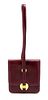 * An Hermes Rouge Leather Shoulder Bag, 9 x 8 x 1 inches.
