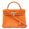 * An Hermes 32cm Orange Leather Kelly Bag,