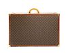 A Louis Vuitton Monogram Canvas Hard-sided Suitcase, 31 1/2 x 20 x 8 1/2 inches.
