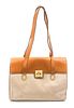 * A Celine Ivory Canvas and Tan Leather Bag, 13 1/2 x 9 x 4 inches.