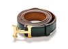 * An Hermes Green Leather Mini Constance Belt, 33 inches.