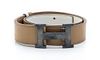 * An Hermes Tan and Ivory Reversible Leather Constance Belt,