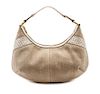 * An Yves Saint Laurent Tan Canvas and Metallic Leather Bag, 15 x 11 x 2 inches.