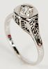 14 karat white gold filigree ring set with center diamond .30 cts.  size 7 1/2