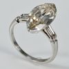 Platinum engagement ring with marquise diamond, 7.7 x 15.9mm, approximately 2cts or more, flanked by emerald cut diamonds.  size 5
