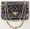 Chanel quilted navy lambskin leather double flap small bag or purse with original dust bag.  ht. 5 1/2 in., approximate wd. 9 1/4...