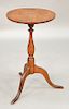 Cherry candlestand with round top on slender turned shaft set on high tripod base, in old finish.  ht. 27 3/4 in., top: 16 1/4" x...