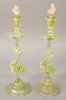 Pair of large Venetian figural glass candlesticks having green glass with gilt flecking, dolphin supports and dolphin finial stopper...