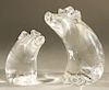 Pair of Steuben glass pig sculptures, designed by Lloyd Atkins, both signed on bottom: Steuben LDA.  ht. 6 1/4 in., & ht. 4 1/2 in...