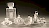 Group of six pieces of Lalique France, frosted glass flower paperweight, Deux Fleurs perfume large "Duncan" crystal perfume bottle,...