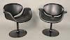 Set of six Pierre Paulin "Little Tulip" chairs, black leather on black tulip form with swivel base, manufactured by Artifort.  Pro...