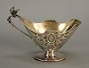 Sterling silver creamer with bird mounted handle and gold washed interior.  ht. 4 1/2 in., lg. 6 1/2 in.,  5.9 t oz.  Provenan...