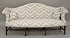 George III camelback sofa,  on square tapered legs with stretcher base, circa 1800.  ht. 38 in., lg. 84 in., dp. 30 in.