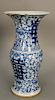 Blue and white beaker vase (gu), China, 19th century, with large central calligraphy against a scrolling floral and foliage backgrou...
