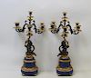 Pair of patinated Gilt Bronze and Lapis Figural