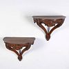 Pair Italian Rococo carved fruitwood wall brackets