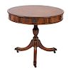 * A Regency Style Mahogany Drum Table Height 26 3/4 x diameter 30 inches.